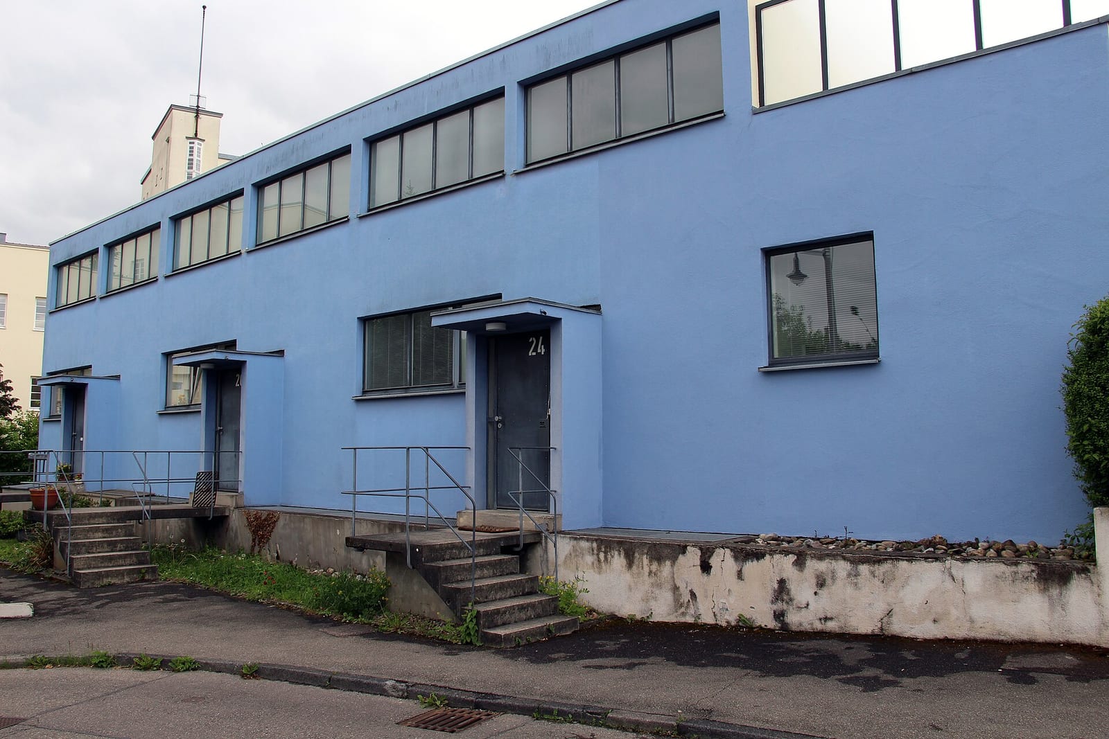 White modernist house by Mart Stam in Stuttgart's Weissenhof Estate of 1927