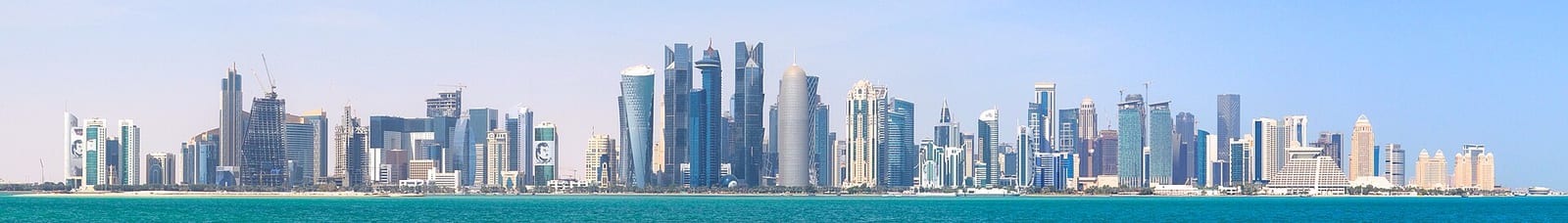 Ultra-wide 7:1 daytime panorama of the West Bay skyline of Doha photographed from Al Corniche in February 2018.