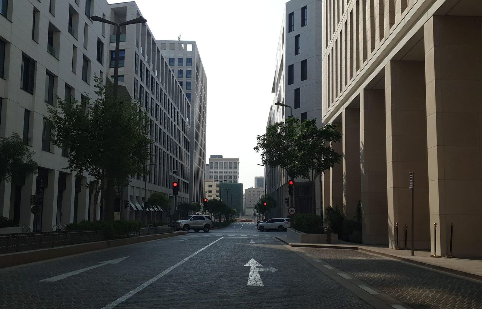 Cream stone streetscape of Msheireb Downtown Doha on Abdullah Bin Thani Street, photographed in November 2020.