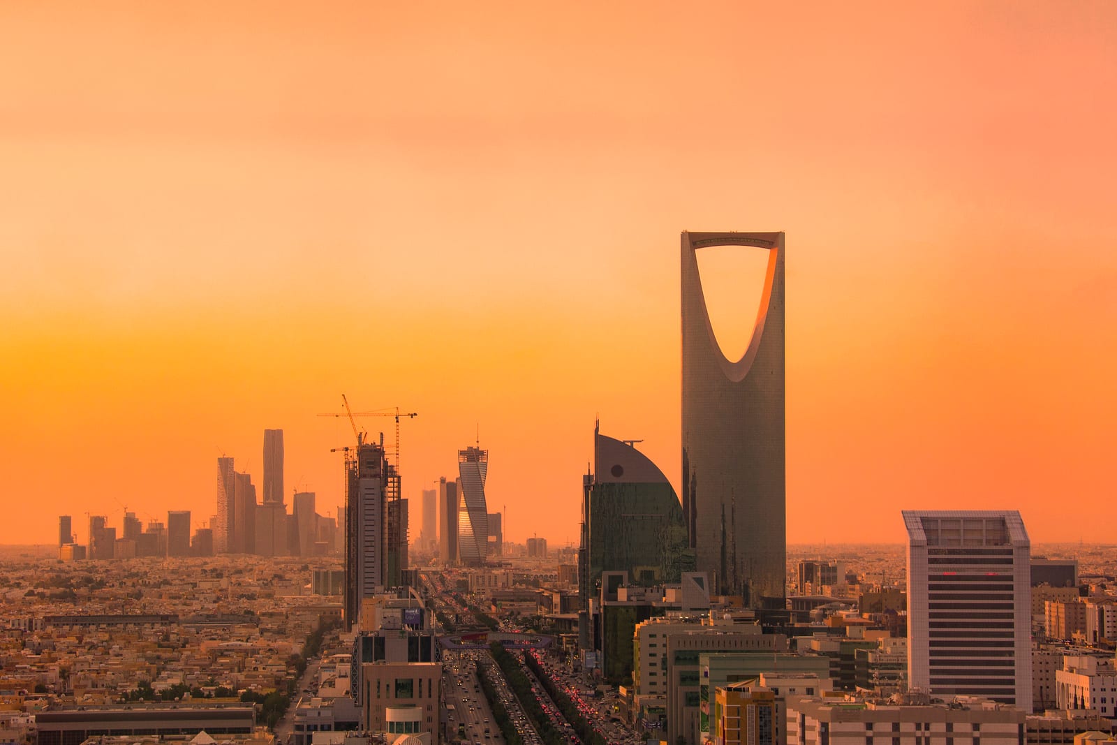 Riyadh north skyline in 2016: Kingdom Tower, Majdoul Tower and the King Abdullah Financial District towers under a clear sky.