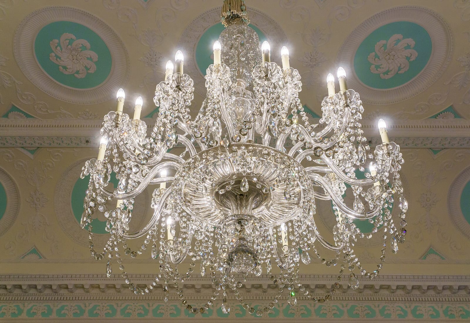 Chandelier and gilded ceiling of the 18th-century Adam Room inside the Lloyd's building, London.