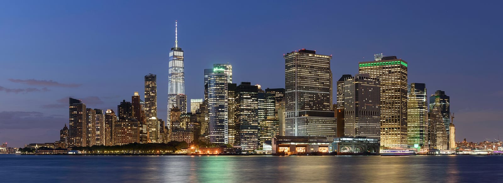 Lower Manhattan skyline with One World Trade Center seen across the harbour from Governors Island, August 2017.