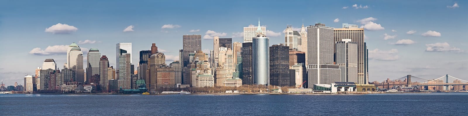 Panorama of the Lower Manhattan skyline seen from the water of New York Harbor, January 2006.