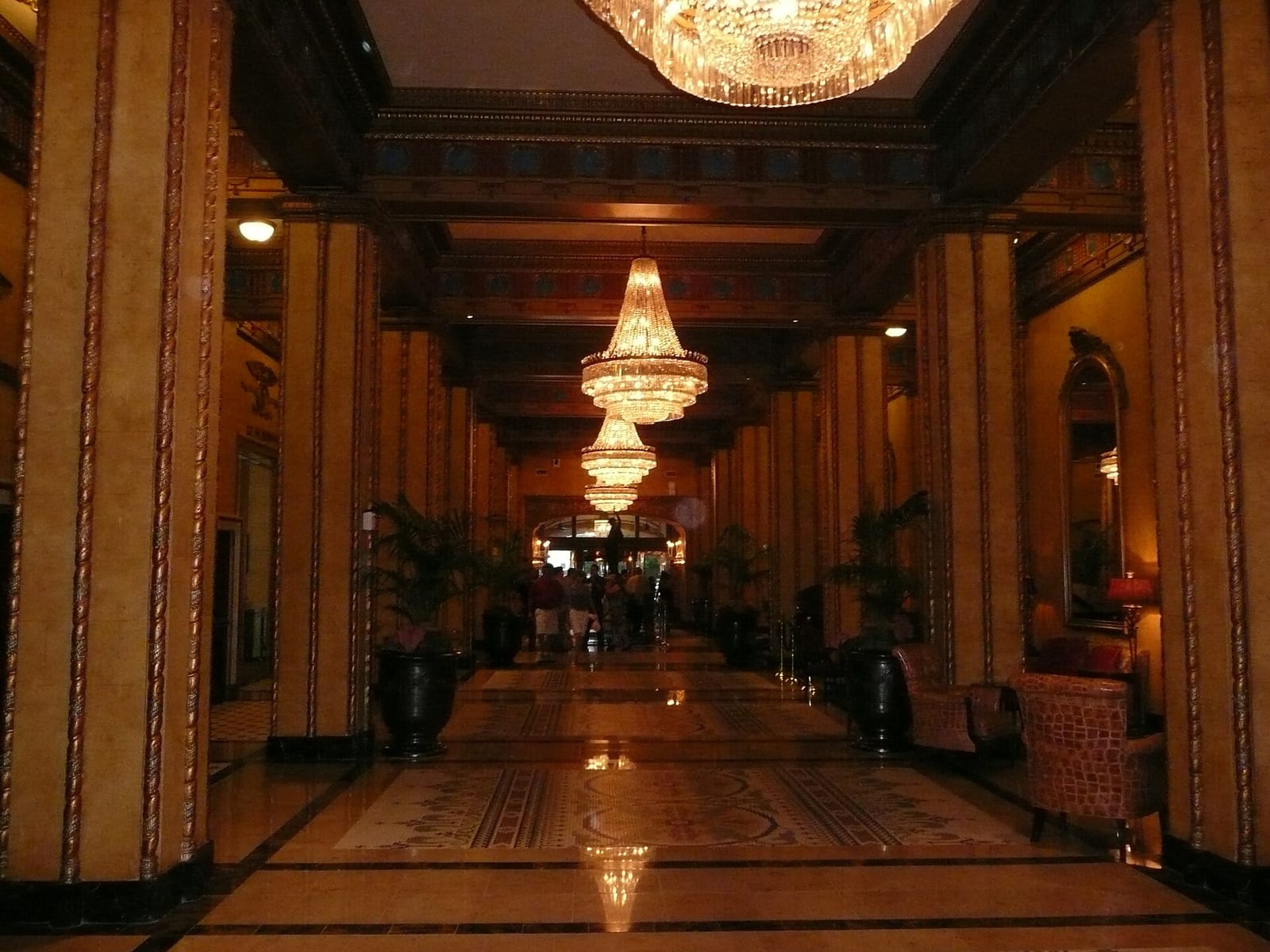 Long block-through lobby of the Roosevelt Hotel, New Orleans, with chandeliers, columns and marble floors, June 2011.