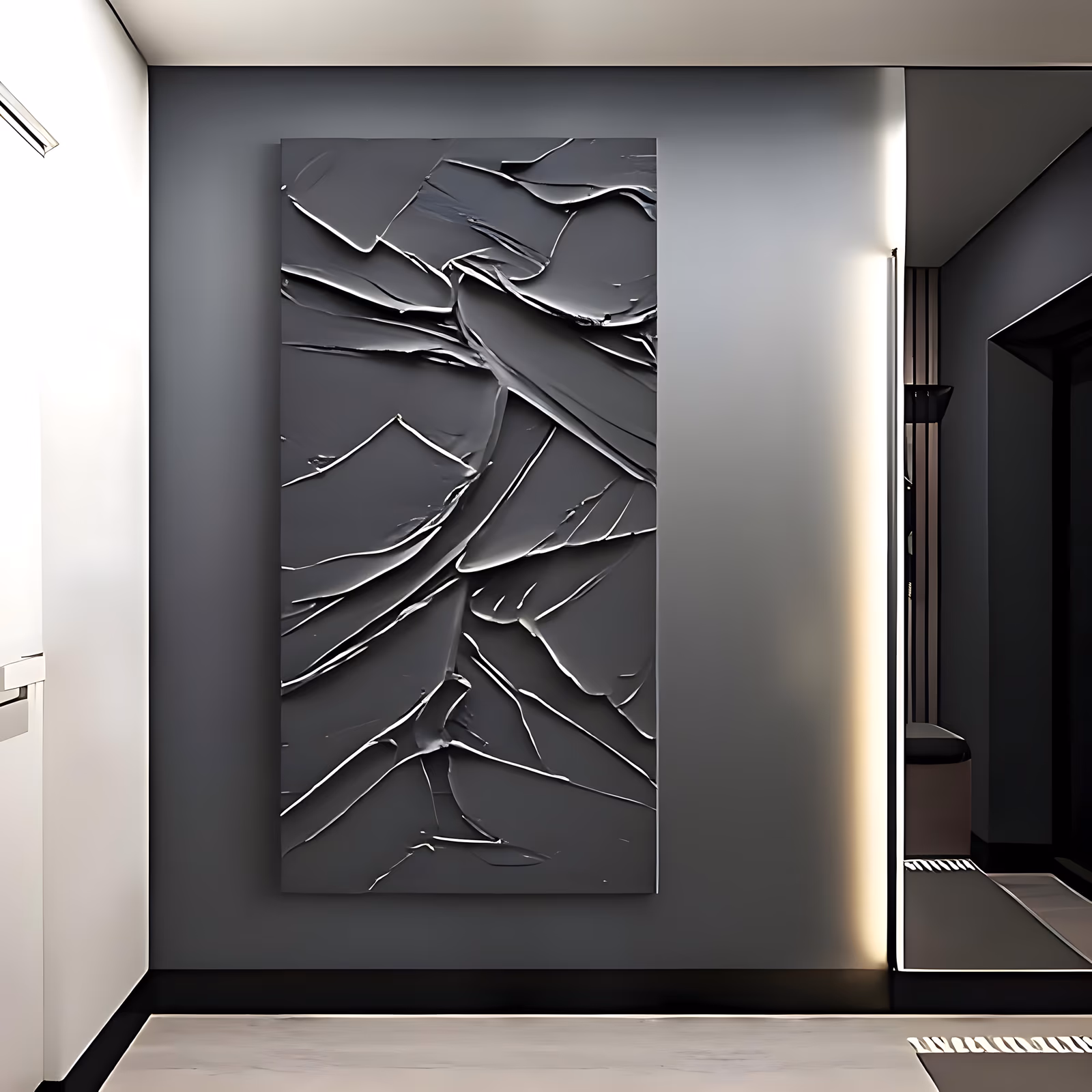 a tall vertical monochrome painting of overlapping black plaster sweeps laid at angles over the full canvas, their raised knife edges catching light in thin charcoal gray highlights