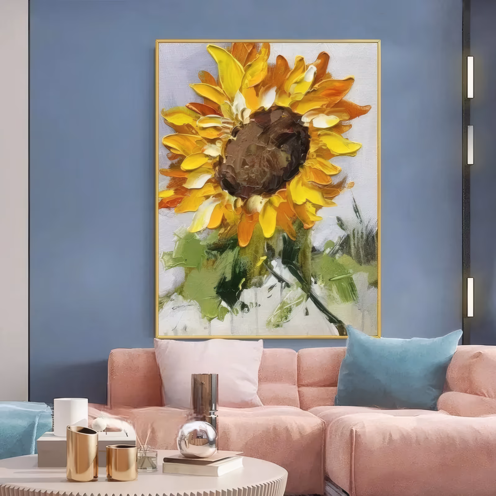 a large vertical floral painting of one sunflower filling the upper canvas, gold and orange petals ridged around a dark brown seed head, with green stem strokes below on a pale grey ground, in thick palette-knife oil