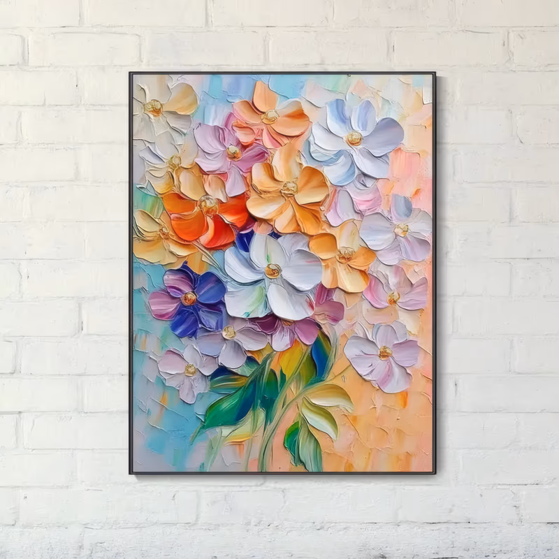 a large vertical sculpted flower painting of a loose cluster of blossoms in orange, lavender, white and deep blue with raised gold centers, over a pale blue and peach ground with green leaves below